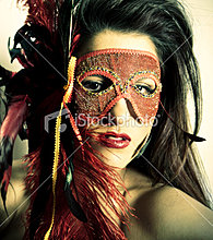 ist2_8546930-young-woman-wearing-masquerade-mask.jpg